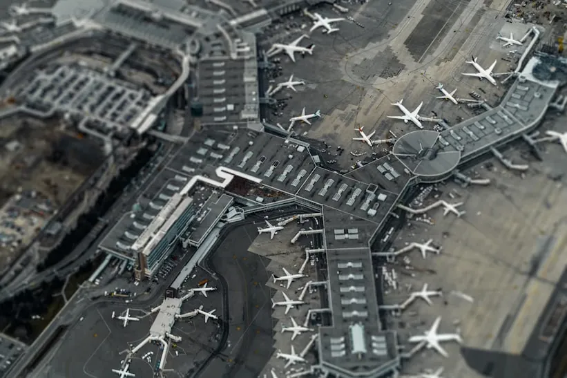 An airfield at night under the approach lights